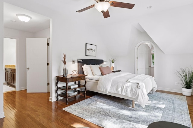 1215 Eleanor Ave, Saint Paul, MN 55116 - bedroom with wood finished floors, lofted ceiling, arched walkways, baseboards, and a ceiling fan