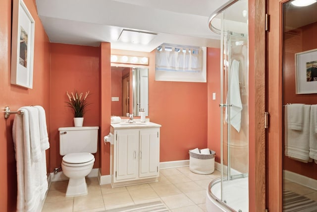 1215 Eleanor Ave, Saint Paul, MN 55116 - bathroom featuring a stall shower, vanity, toilet, tile patterned flooring, and baseboards