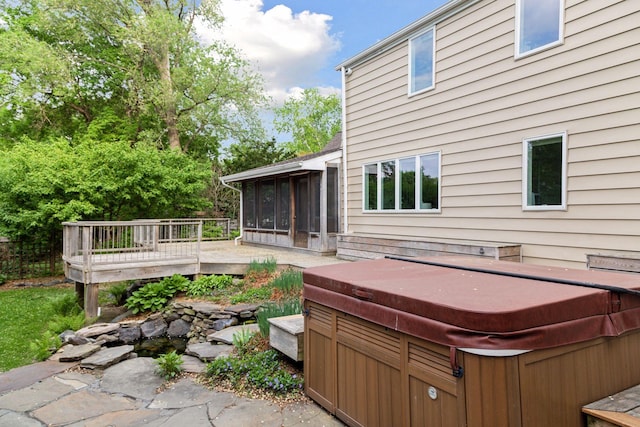 1215 Eleanor Ave, Saint Paul, MN 55116 - wooden terrace with a hot tub and a sunroom