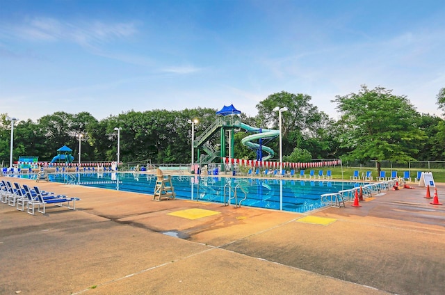 1215 Eleanor Ave, Saint Paul, MN 55116 - community pool with fence and view of wooded area