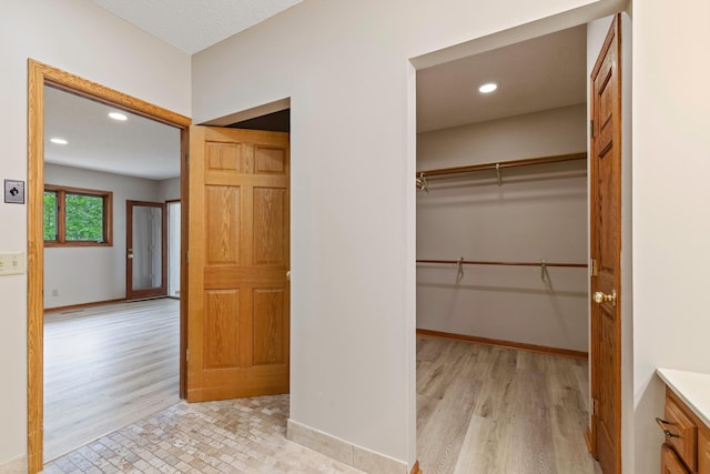 4306 Woods Way, Minnetonka, MN 55345 - spacious closet with wood finished floors