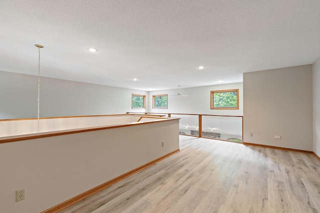 4306 Woods Way, Minnetonka, MN 55345 - spare room featuring light wood-style floors, baseboards, and recessed lighting