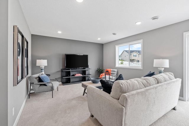 736 Blackbird Cir, Delano, MN 55328 - living area with light colored carpet, recessed lighting, and baseboards