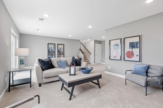 736 Blackbird Cir, Delano, MN 55328 - living room with light carpet, stairway, baseboards, and recessed lighting