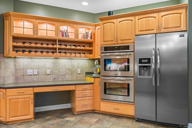 2508 4th Ave NW, Austin, MN 55912 - kitchen with appliances with stainless steel finishes, dark countertops, backsplash, glass insert cabinets, and open shelves