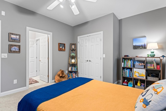 2508 4th Ave NW, Austin, MN 55912 - carpeted bedroom with a closet, baseboards, and ceiling fan