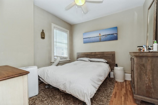 3520 Emerson Ave S Unit 202, Minneapolis, MN 55408 - bedroom featuring wood finished floors and ceiling fan