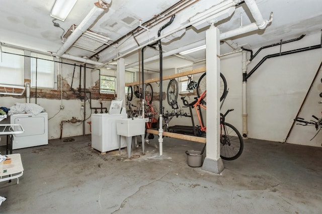 3520 Emerson Ave S Unit 202, Minneapolis, MN 55408 - basement featuring washing machine and dryer and a sink