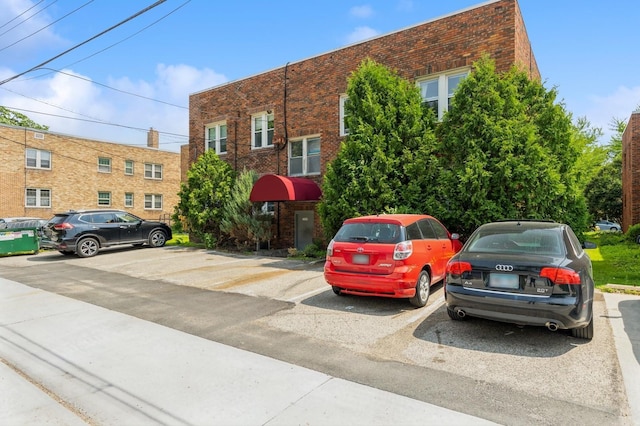 3520 Emerson Ave S Unit 202, Minneapolis, MN 55408 - view of property featuring uncovered parking