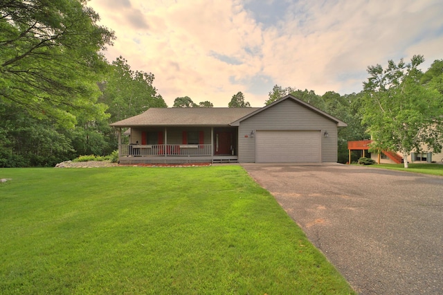 4741 Briarwood Ln, Baxter, MN 56425 - single story home with driveway, covered porch, a garage, and a front lawn