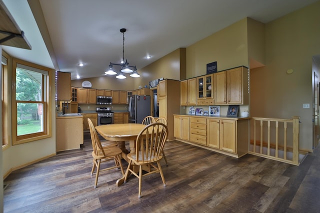 4741 Briarwood Ln, Baxter, MN 56425 - dining space featuring high vaulted ceiling, dark wood finished floors, and a chandelier