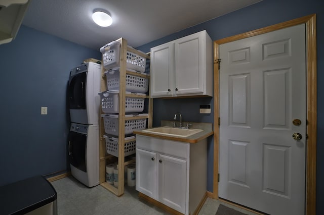 4741 Briarwood Ln, Baxter, MN 56425 - washroom featuring stacked washing machine and dryer, cabinet space, and light flooring