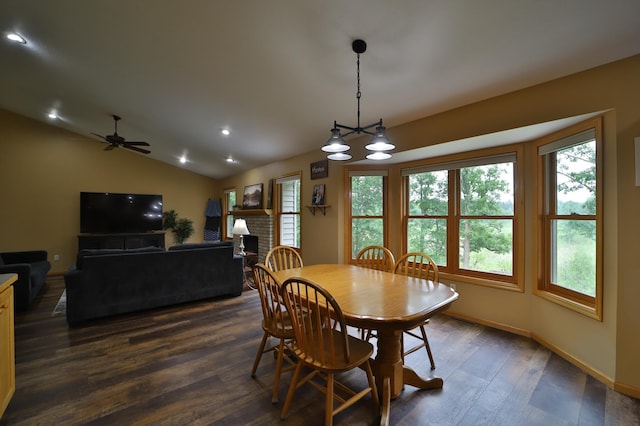 4741 Briarwood Ln, Baxter, MN 56425 - dining room featuring dark wood-style floors, vaulted ceiling, recessed lighting, ceiling fan, and a fireplace