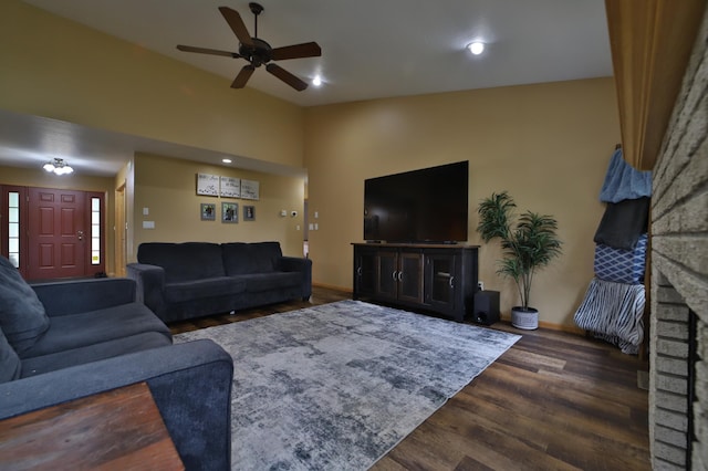 4741 Briarwood Ln, Baxter, MN 56425 - living area featuring ceiling fan, dark wood finished floors, vaulted ceiling, and a fireplace