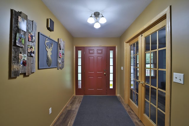 4741 Briarwood Ln, Baxter, MN 56425 - foyer entrance with french doors, wood finished floors, and a chandelier