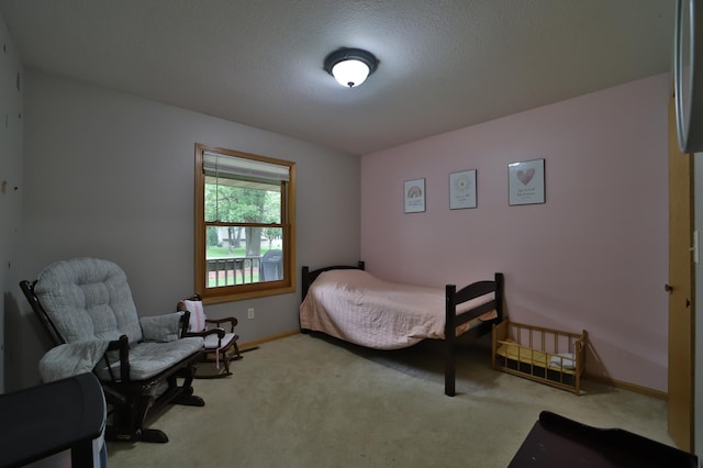 4741 Briarwood Ln, Baxter, MN 56425 - carpeted bedroom with a textured ceiling and baseboards