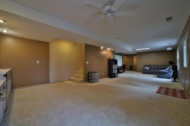 4741 Briarwood Ln, Baxter, MN 56425 - carpeted living room with stairway and a ceiling fan