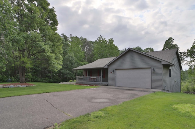 4741 Briarwood Ln, Baxter, MN 56425 - view of front of house featuring a porch, a garage, a front lawn, driveway, and a shingled roof