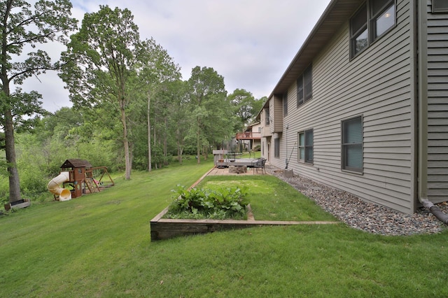 4741 Briarwood Ln, Baxter, MN 56425 - view of grassy yard featuring a playground