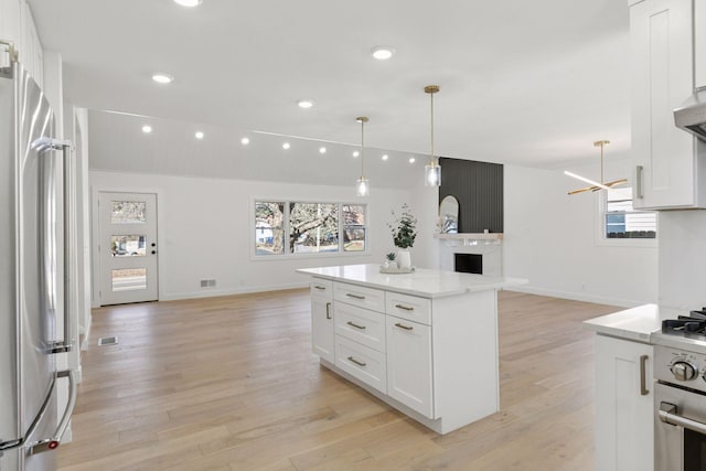 1022 Fairview Ave S, Saint Paul, MN 55116 - kitchen featuring open floor plan, appliances with stainless steel finishes, healthy amount of natural light, and recessed lighting