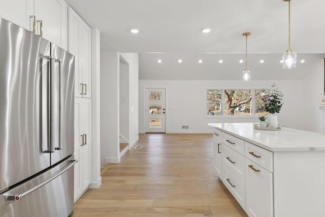 1022 Fairview Ave S, Saint Paul, MN 55116 - kitchen with high end fridge, recessed lighting, white cabinetry, light wood-type flooring, and baseboards
