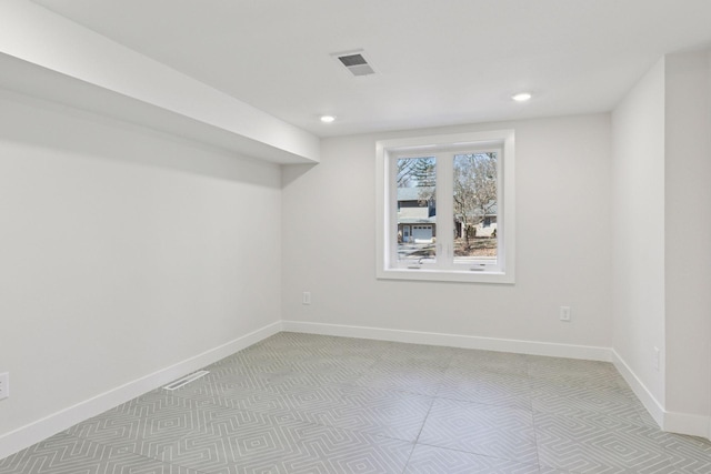 1022 Fairview Ave S, Saint Paul, MN 55116 - spare room with baseboards and recessed lighting