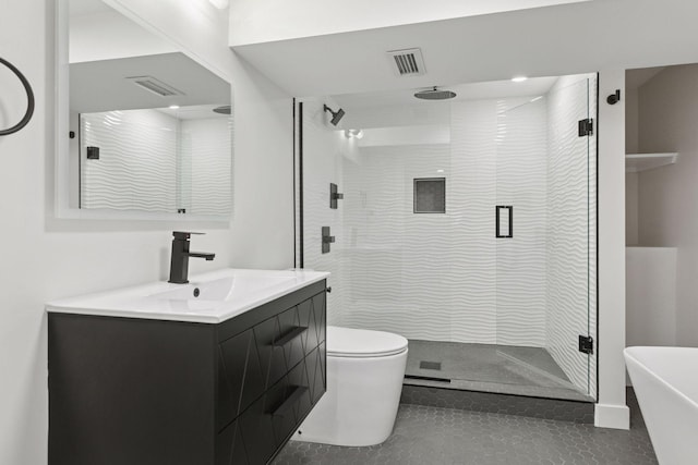 1022 Fairview Ave S, Saint Paul, MN 55116 - bathroom with a shower stall, vanity, toilet, a freestanding tub, and recessed lighting