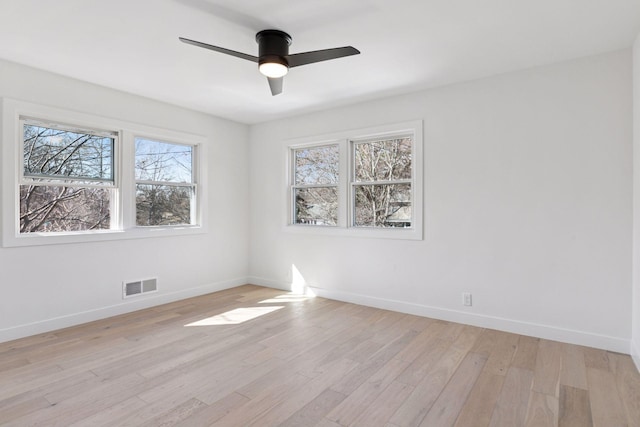 1022 Fairview Ave S, Saint Paul, MN 55116 - spare room with a ceiling fan, baseboards, and light wood finished floors