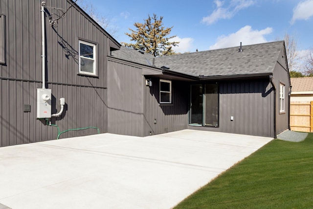 1022 Fairview Ave S, Saint Paul, MN 55116 - back of house featuring a patio and roof with shingles