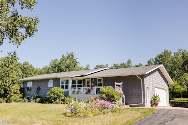 28040 Anchor Rd, Detroit Twp, MN 56501 - ranch-style home with covered porch, a front lawn, an attached garage, and asphalt driveway
