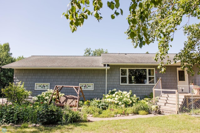 28040 Anchor Rd, Detroit Twp, MN 56501 - ranch-style home featuring a shingled roof and a front lawn