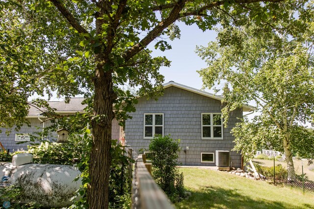 28040 Anchor Rd, Detroit Twp, MN 56501 - back of house with central air condition unit