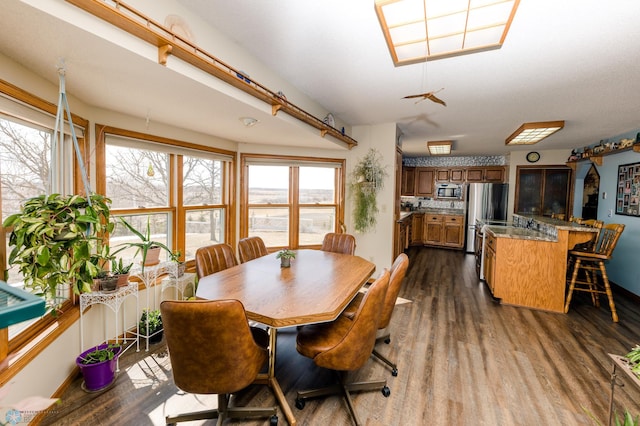 28040 Anchor Rd, Detroit Twp, MN 56501 - dining space featuring dark wood-style flooring