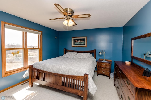 28040 Anchor Rd, Detroit Twp, MN 56501 - bedroom with light carpet, ceiling fan, and baseboards