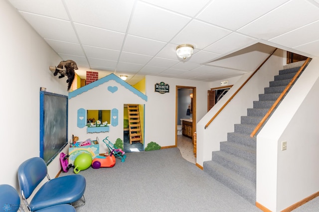 28040 Anchor Rd, Detroit Twp, MN 56501 - playroom with carpet floors, baseboards, and a drop ceiling