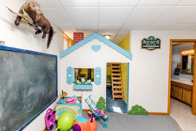 28040 Anchor Rd, Detroit Twp, MN 56501 - playroom featuring a paneled ceiling, a sink, and baseboards