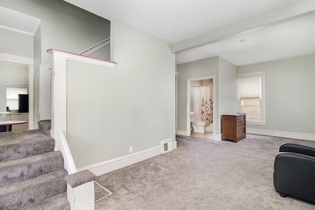 1430 Penn Ave N, Minneapolis, MN 55411 - sitting room with carpet floors, baseboards, and stairs