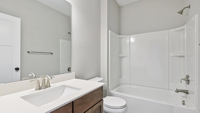 full bath with toilet, washtub / shower combination, and vanity