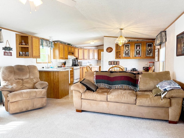 20429 326th Ave Unit 15, Isle, MN 56342 - living room with light colored carpet, a textured ceiling, lofted ceiling, and a ceiling fan