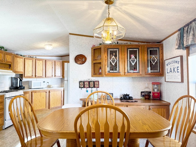 20429 326th Ave Unit 15, Isle, MN 56342 - dining room with a textured ceiling, ornamental molding, and wallpapered walls