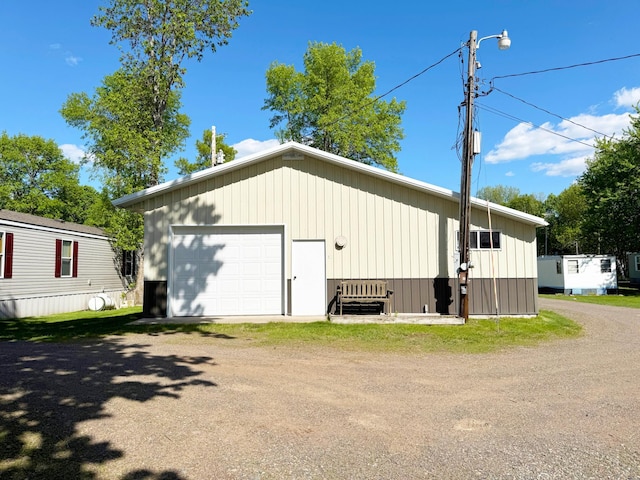 20429 326th Ave Unit 15, Isle, MN 56342 - detached garage with dirt driveway