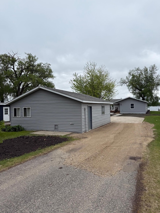 14646 Tradewinds Rd, Lake Eunice Twp, MN 56511 - view of home's exterior with driveway