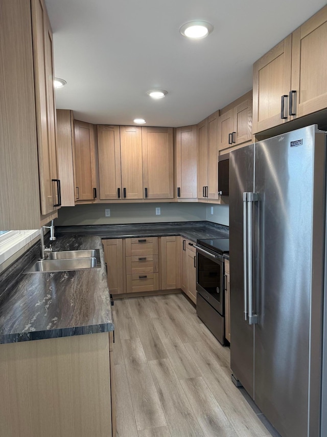 14646 Tradewinds Rd, Lake Eunice Twp, MN 56511 - kitchen featuring stainless steel appliances, a sink, light brown cabinets, light wood-style floors, and recessed lighting