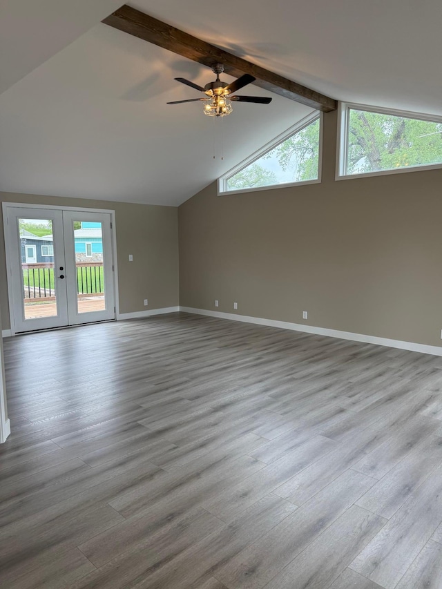 14646 Tradewinds Rd, Lake Eunice Twp, MN 56511 - empty room featuring wood finished floors, baseboards, a ceiling fan, and french doors