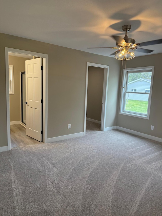 14646 Tradewinds Rd, Lake Eunice Twp, MN 56511 - unfurnished bedroom with carpet floors, baseboards, and ceiling fan