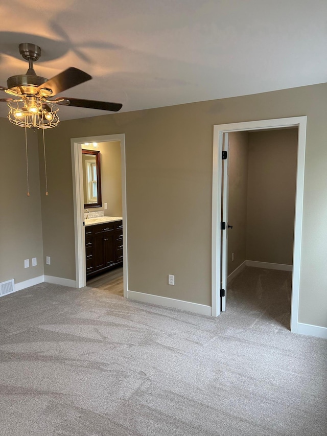 14646 Tradewinds Rd, Lake Eunice Twp, MN 56511 - unfurnished bedroom with light carpet, baseboards, and a spacious closet