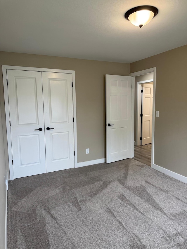 14646 Tradewinds Rd, Lake Eunice Twp, MN 56511 - unfurnished bedroom with baseboards, carpet floors, and a closet