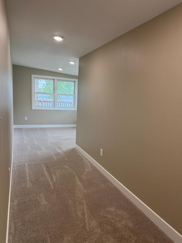 14646 Tradewinds Rd, Lake Eunice Twp, MN 56511 - spare room with carpet flooring, baseboards, and recessed lighting