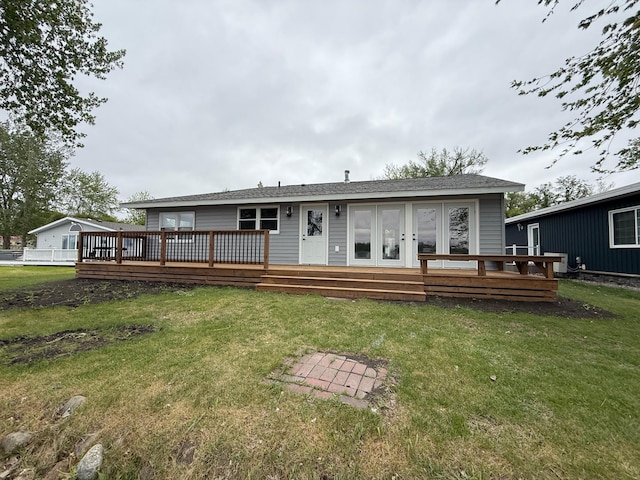 14646 Tradewinds Rd, Lake Eunice Twp, MN 56511 - back of property featuring a wooden deck, french doors, and a yard