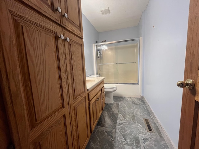 1803 214th Ave NE, East Bethel, MN 55011 - full bath featuring shower / bath combination with glass door, vanity, and marble finish floors